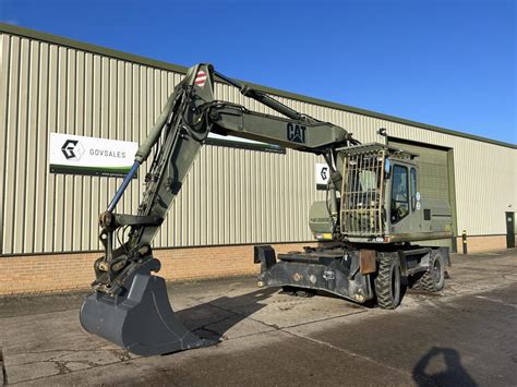 mobile excavator|cat 318 wheeled excavator.